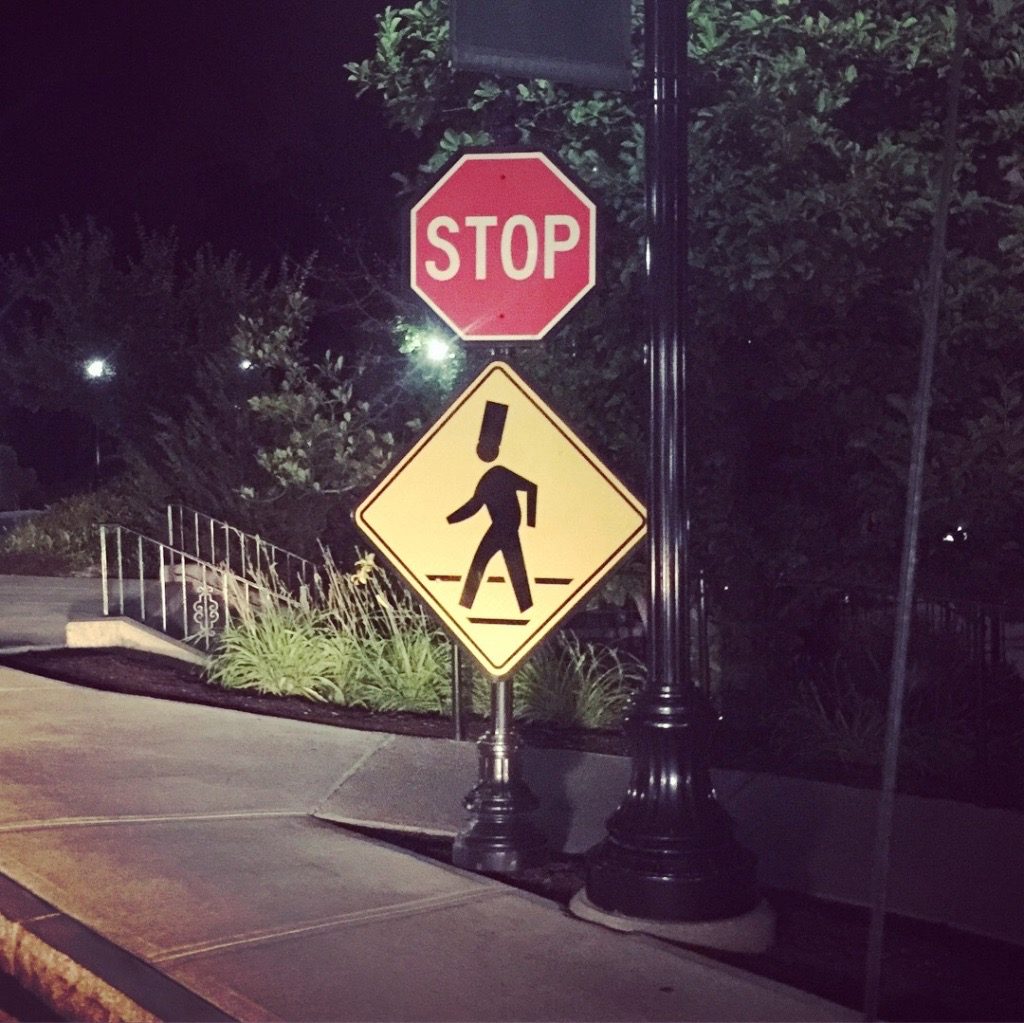 Pedestrian crossing sign with chef's hat