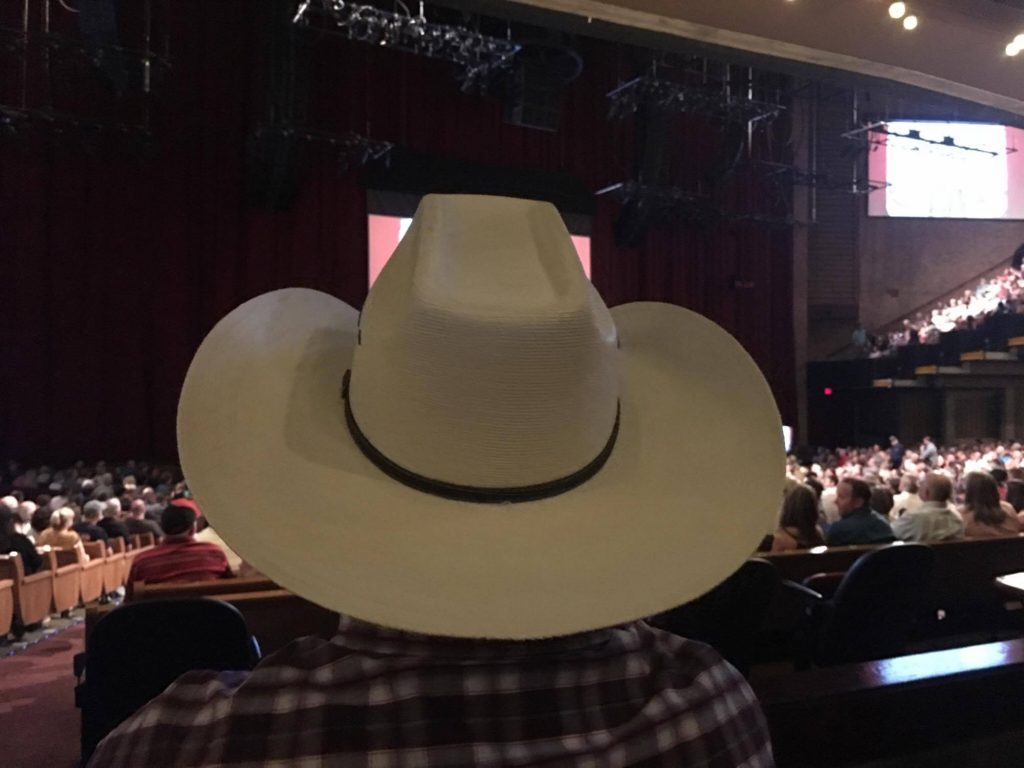Grand Ole Opry view obstructed by cowboy hat